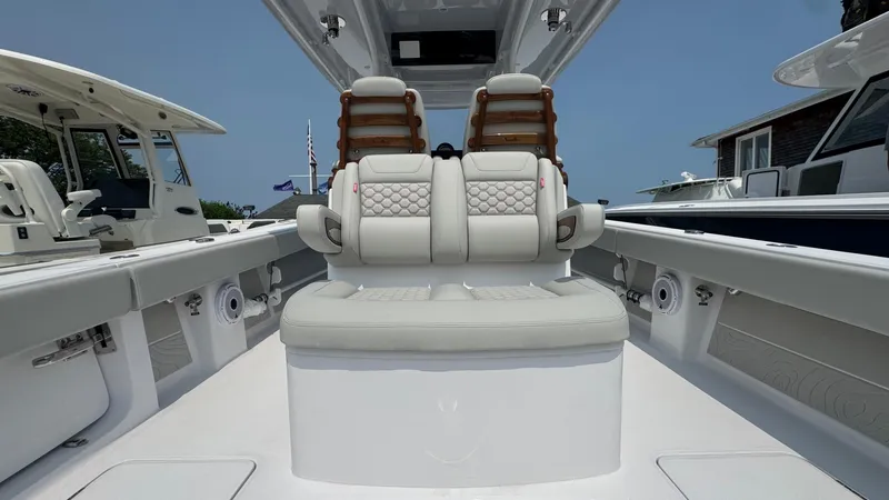 Slide: The Image of 2026 Jupiter 32 boat interior with luxurious seating and modern design. - 11