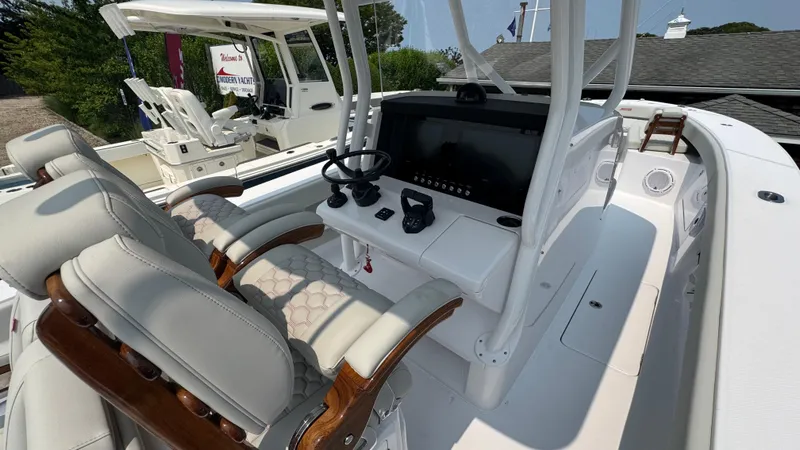 Slide: The Image of Luxury Jupiter 32 boat interior with modern helm, 2026 model. - 24