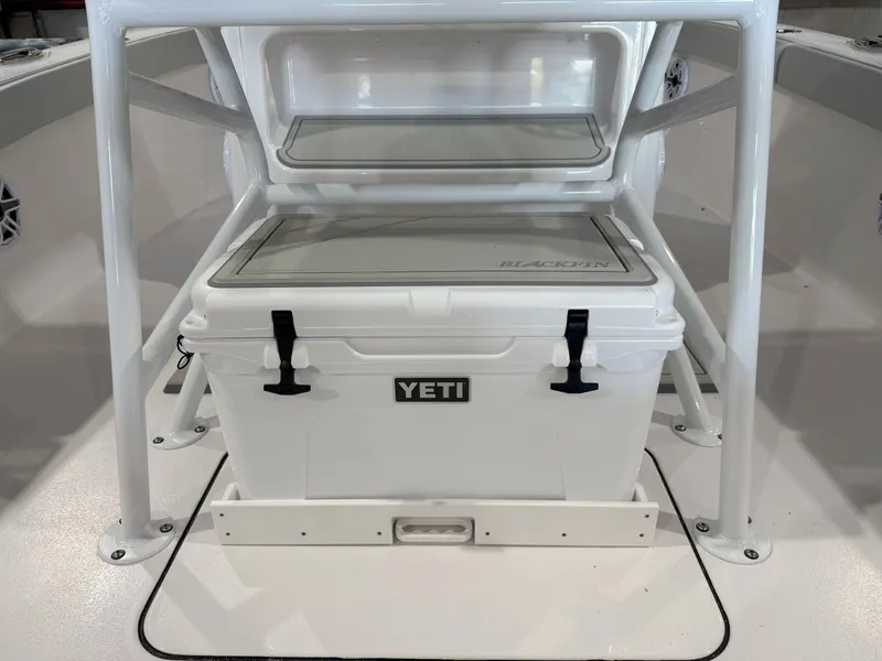 Slide: The Image of White YETI cooler on 2026 Blackfin 242HB boat deck. - 18