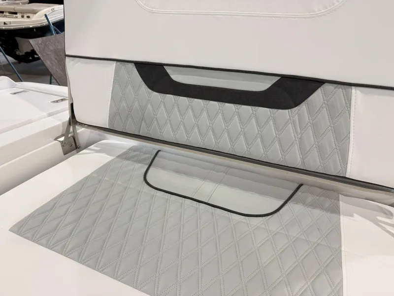 Slide: The Image of 2026 Blackfin 242HB boat seat with diamond-patterned upholstery and sleek design. - 19