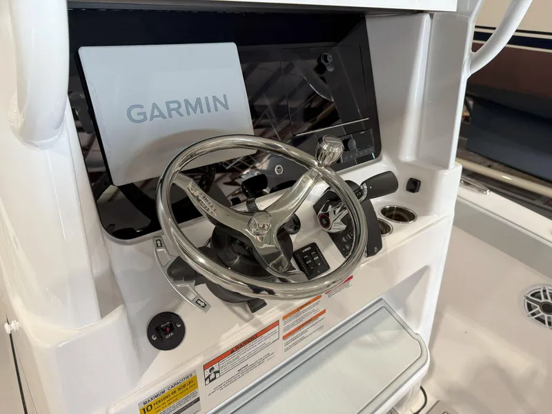 Slide: The Image of Steering console of 2026 Blackfin 242HB boat with Garmin navigation system. - 21