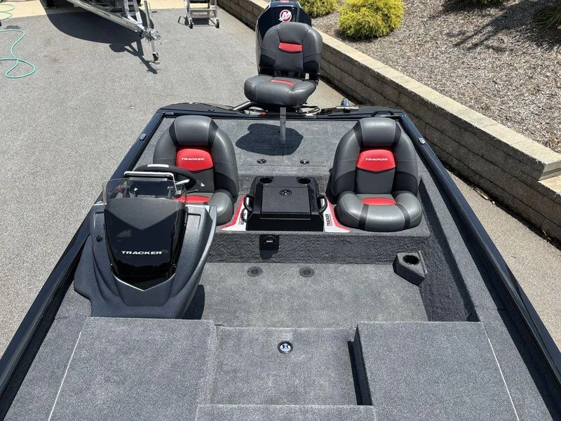 Slide: The Image of 2025 Tracker SAVAGE™ 215 boat interior with sleek seating and modern design. - 11