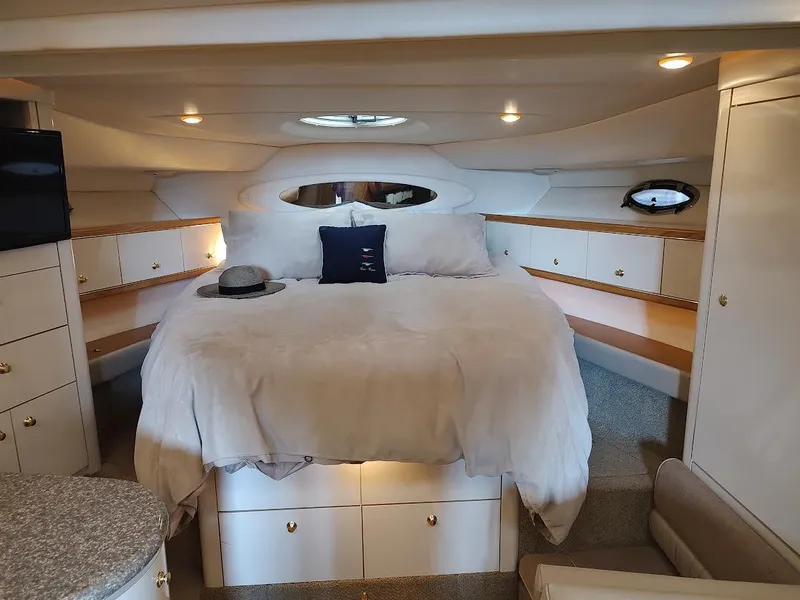 Slide: The Image of Luxurious cabin interior of 1998 Maxum 4100 Sun Bridge SCR yacht. - 16