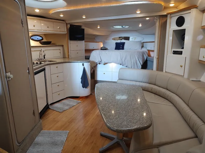 Slide: The Image of Luxurious interior of a 1998 Maxum 4100 Sun Bridge SCR yacht with modern amenities. - 23