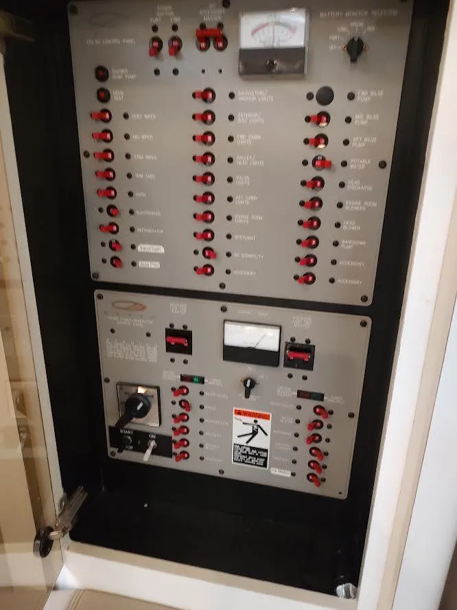 Slide: The Image of Electrical panel of a 1998 Maxum 4100 Sun Bridge SCR boat. - 24