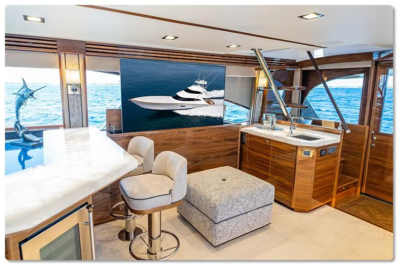 Slide: The Image of Luxurious interior of 2026 Viking 90 Skybridge yacht with modern furnishings and ocean view. - 7