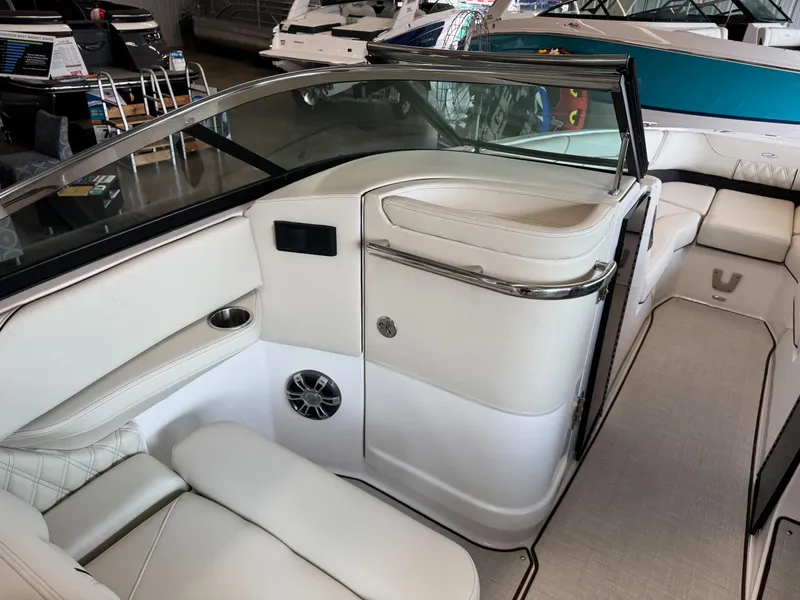 Slide: The Image of Luxurious interior of 2025 Regal LS6 boat with white leather seating and modern design. - 15
