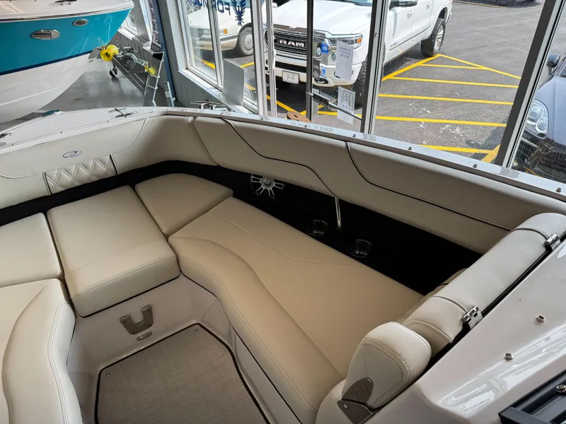 Slide: The Image of Luxurious interior of 2025 Regal LS6 boat with beige seating and modern design. - 7