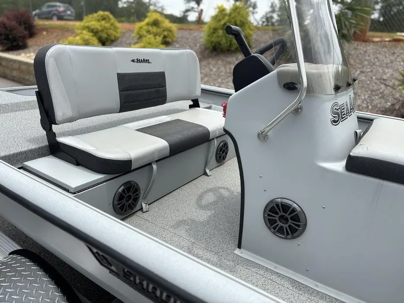 Slide: The Image of 2025 SeaArk Shadow 18 Center Console boat interior with seating and console details. - 9