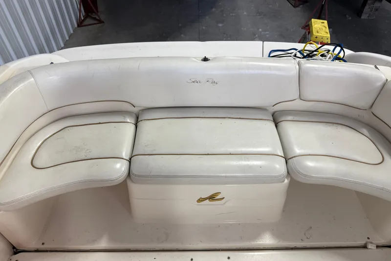 Slide: The Image of White seating on a 1998 Sea Ray 280 Sun Sport boat. - 8