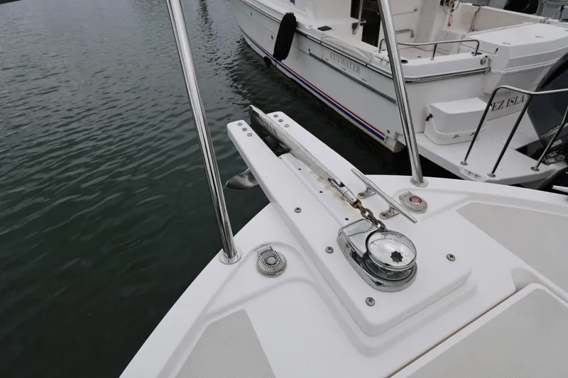 Slide: The Image of Bow of a 2011 Back Cove 30 boat with anchor and railing. - 35