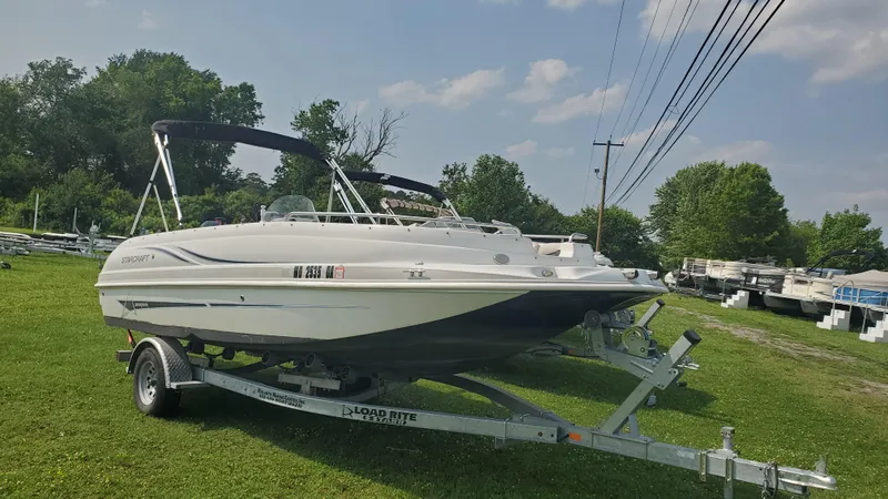 The Image of 2016 Starcraft Limited 1915 OB boat on trailer, parked on grassy area. - 0