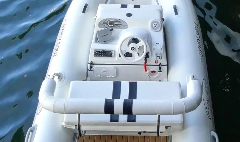 Slide: The Image of Inflatable Aquascan 11 boat, 2015 model, with steering console on calm water. - 5