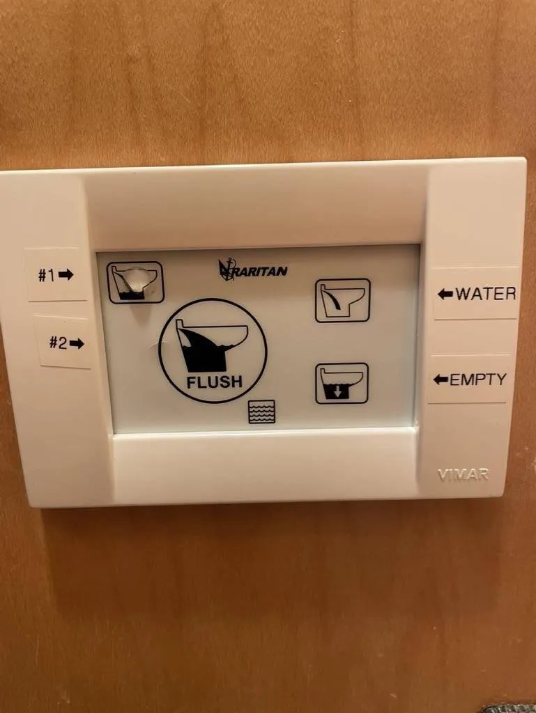 Slide: The Image of Control panel for marine toilet on 1998 Stardust Cruisers 16x77 Houseboat. - 16