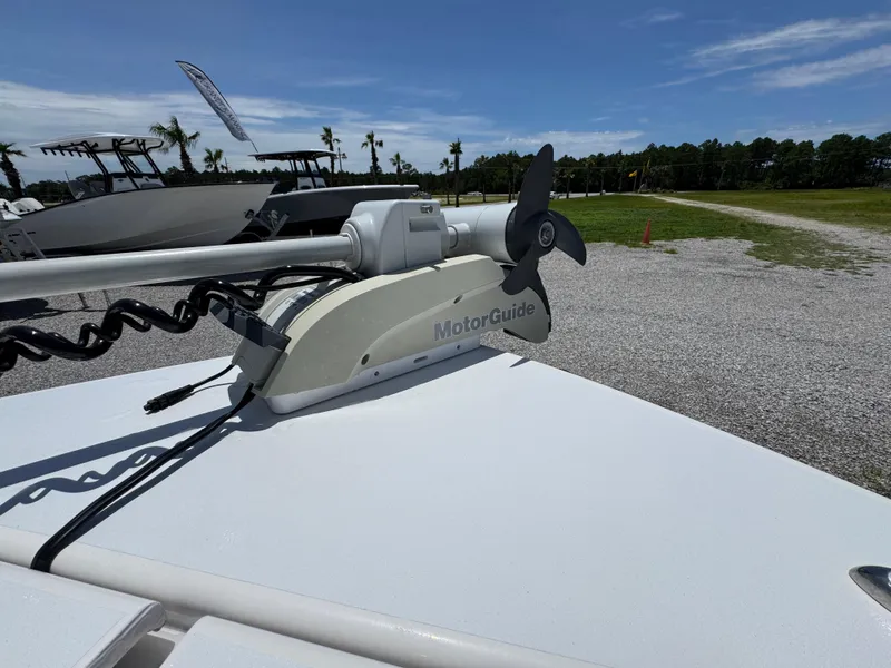 Slide: The Image of Trolling motor on ZCB 26 Freemason boat, 2021 model, parked outdoors. - 17