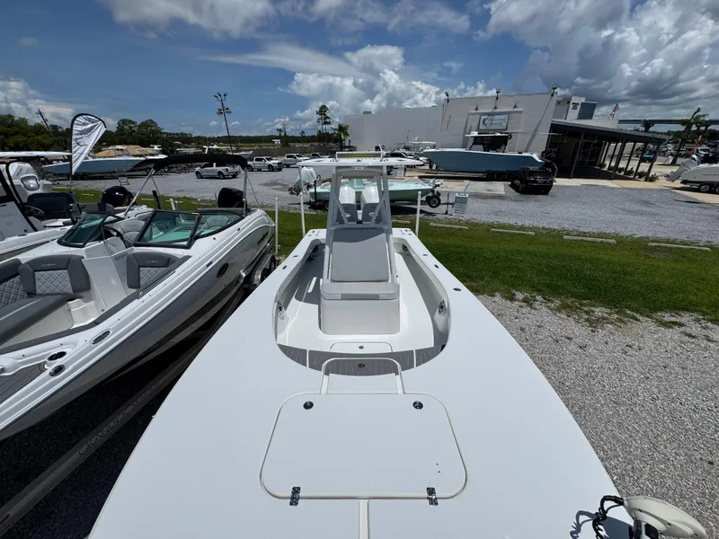 Slide: The Image of 2021 ZCB 26 Freemason boat displayed outdoors under a cloudy sky. - 19