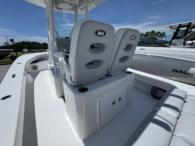 Slide: The Image of 2021 ZCB 26 Freemason boat interior with dual seats and storage compartment. - 28