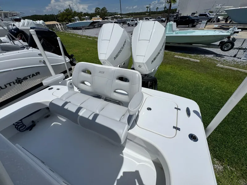 Slide: The Image of ZCB 26 Freemason 2021 boat with dual Mercury engines, white seating, and sleek design. - 31