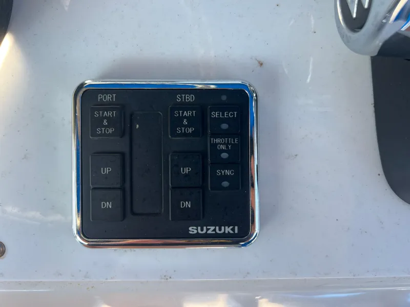 Slide: The Image of Control panel with Suzuki branding on a Spectre 360 Roadster, 2011 model. - 27