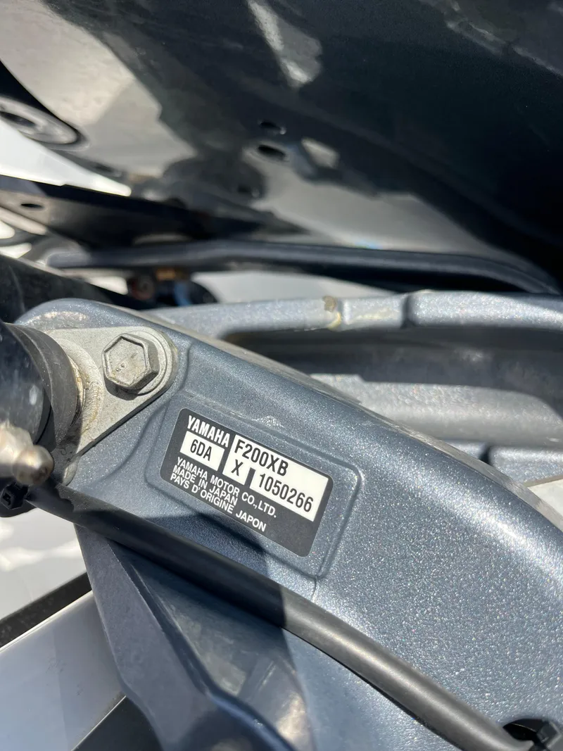 Slide: The Image of Close-up of Yamaha F200XB engine part on 2020 Hurricane SunDeck 235 OB boat. - 20