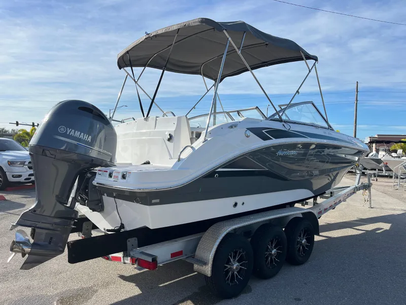 Slide: The Image of 2020 Hurricane SunDeck 235 OB boat on trailer with Yamaha outboard motor. - 4