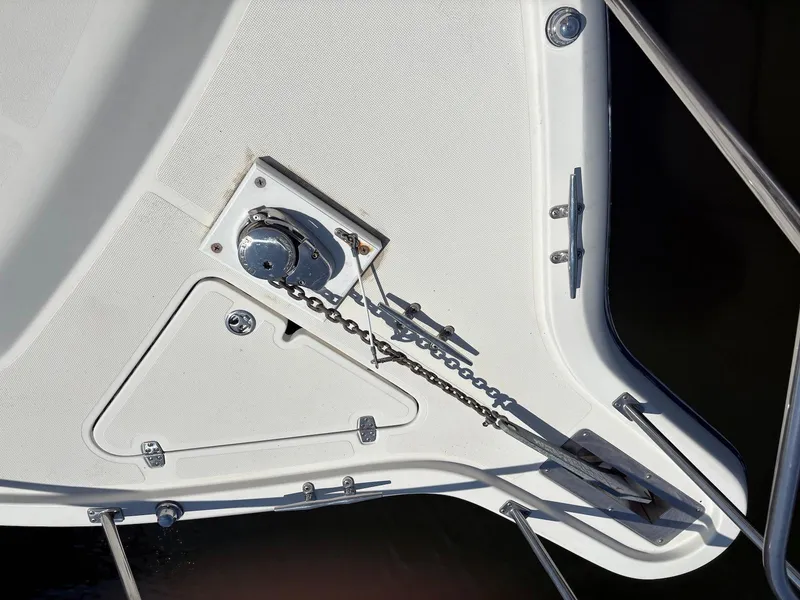 Slide: The Image of Anchor system on 2002 Pursuit 3000 Express boat deck. - 12