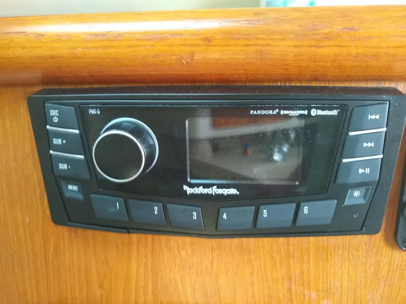 Slide: The Image of Rockford Fosgate audio system in 2002 Pursuit 3000 Express boat, featuring Bluetooth and Pandora connectivity. - 22