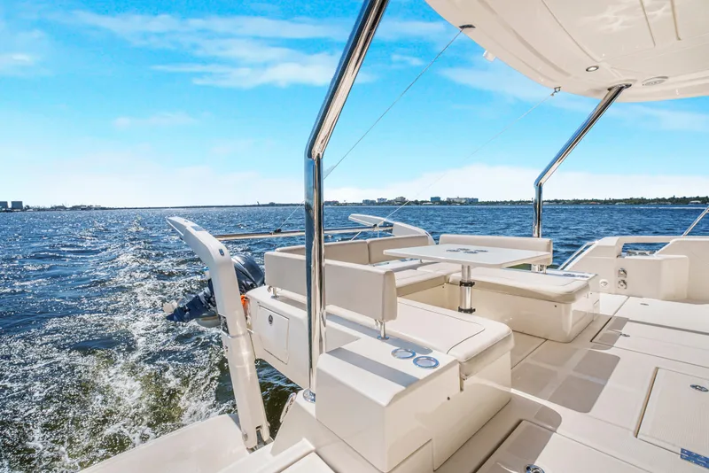 Slide: The Image of Aquila 44 Yacht 2017 cruising on open water under clear blue skies. - 14