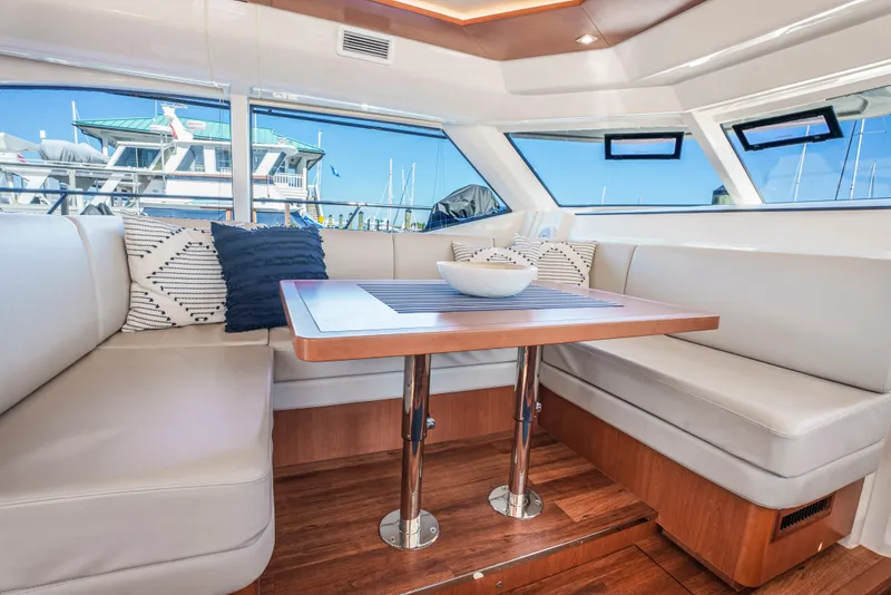 Slide: The Image of Luxurious interior of 2017 Aquila 44 Yacht with elegant seating and table. - 20