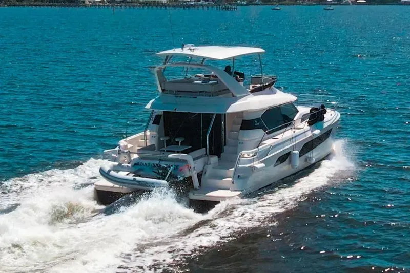 Slide: The Image of Aquila 44 Yacht cruising on blue water, 2017 model. - 4