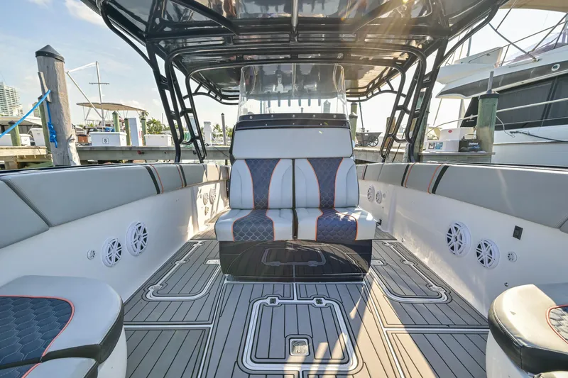 Slide: The Image of 2014 Midnight Express 37’ Open boat interior with modern seating and sleek design. - 19
