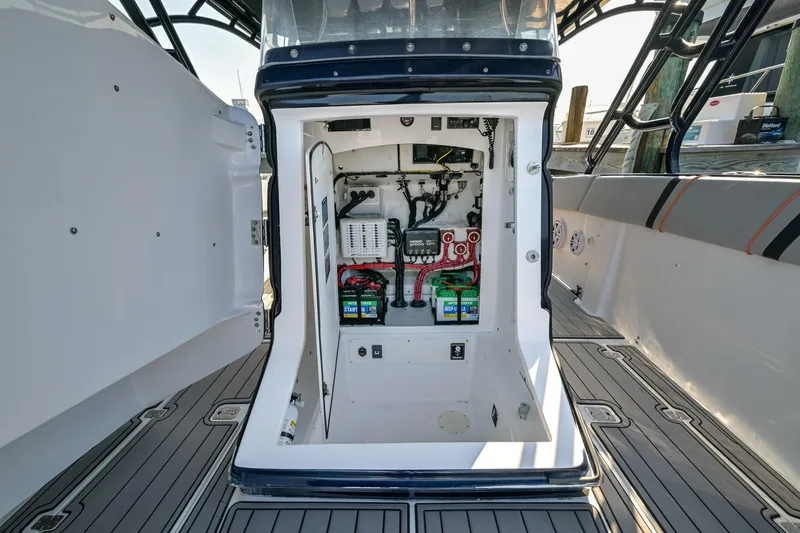 Slide: The Image of 2014 Midnight Express 37’ Open boat electrical compartment with batteries and wiring. - 21
