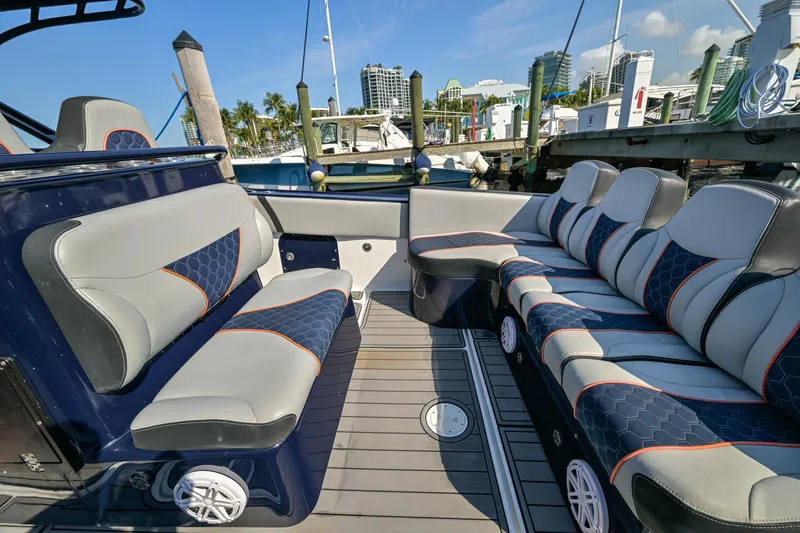 Slide: The Image of Luxurious seating on a 2014 Midnight Express 37’ Open boat at a marina. - 33
