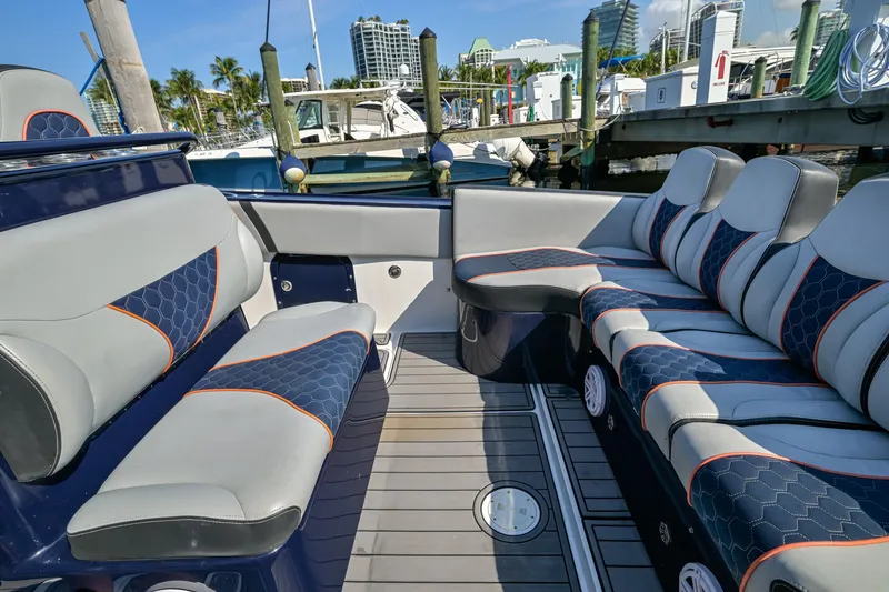 Slide: The Image of 2014 Midnight Express 37’ Open boat interior with stylish seating at marina. - 34