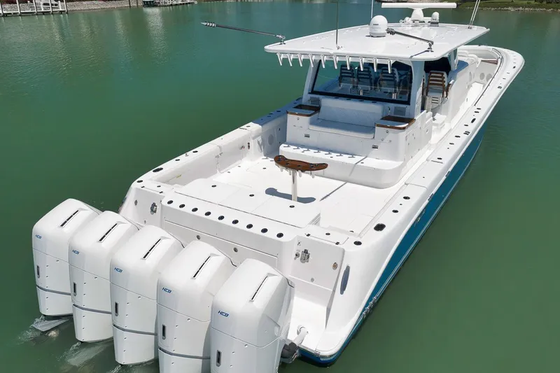 Slide: The Image of 2024 HCB 65 Estrella boat with five outboard engines. - 9