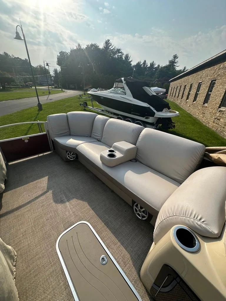 Slide: The Image of 2017 Godfrey Sweetwater 2386 CC pontoon boat with spacious seating and cup holders. - 14
