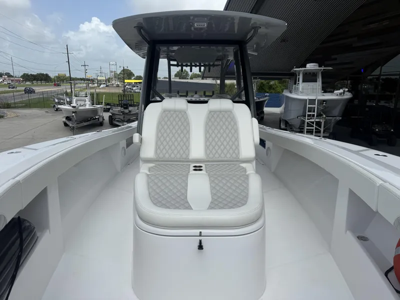 Slide: The Image of 2024 Front Runner 39 CC boat with sleek seating and modern design. - 14