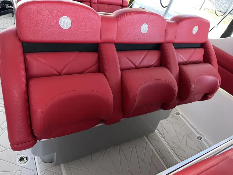 Slide: The Image of Red leather seats on a 2019 Mystic Powerboats M4200. - 16
