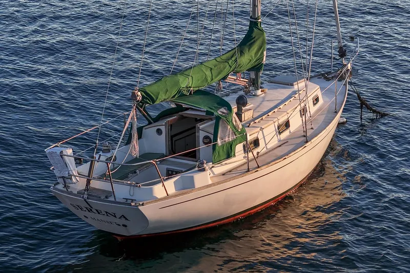 Slide: The Image of Sailboat "Serena" on water, Morris Linda 28, 1988 model, with green sail cover. - 5