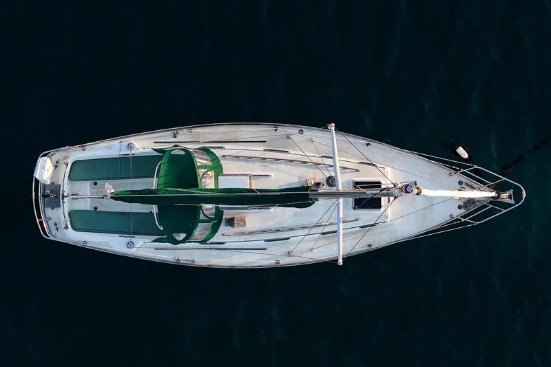 Slide: The Image of Overhead view of 1988 Morris Linda 28 sailboat on dark water. - 6