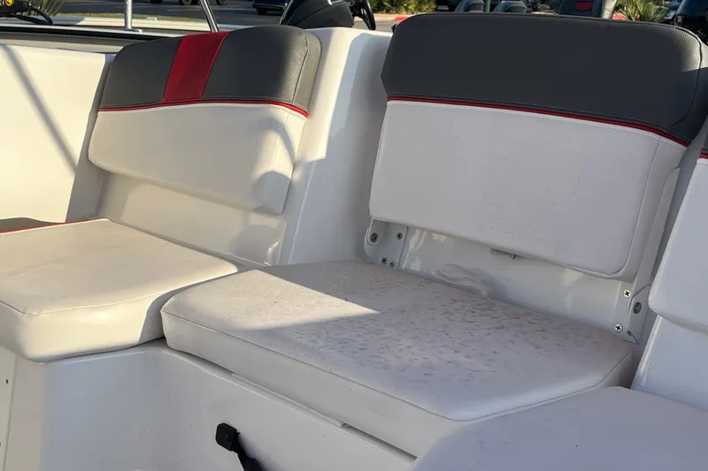 Slide: The Image of 2025 Tahoe T16 boat interior seating with white and gray upholstery. - 7