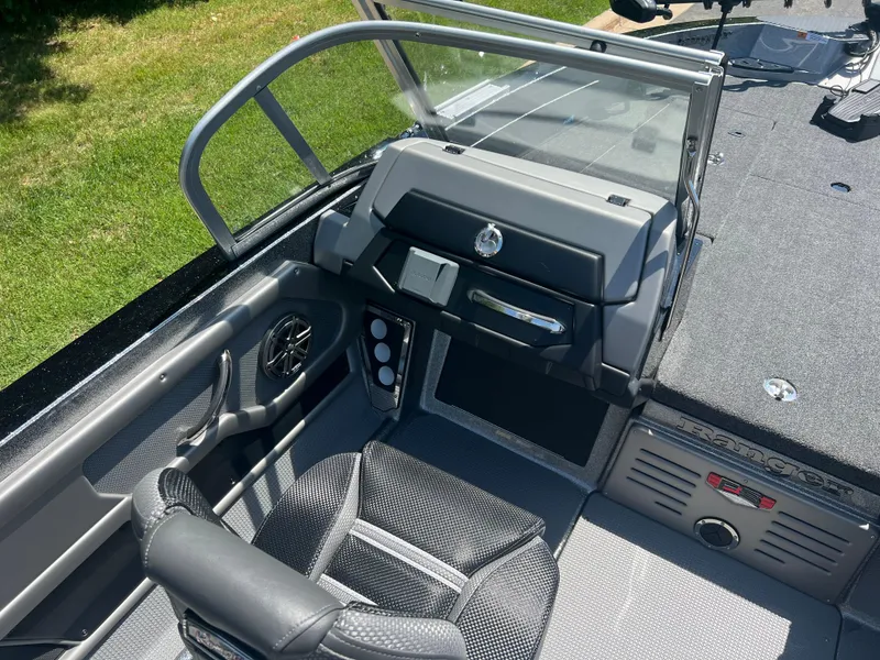 Slide: The Image of 2025 Ranger 621FS Cup Equipped boat interior with modern dashboard and seating. - 4