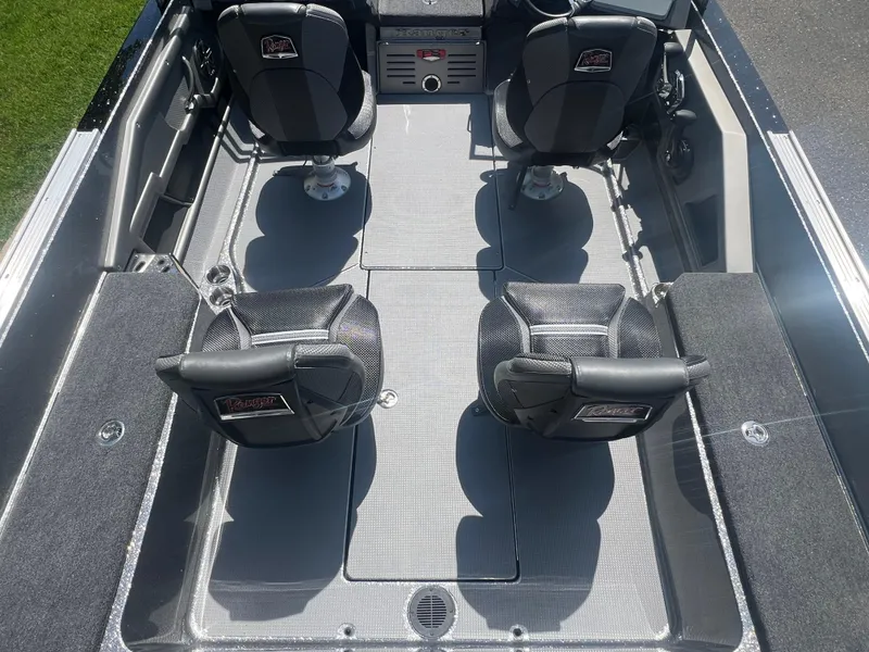 Slide: The Image of 2025 Ranger 621FS Cup Equipped boat interior with four black seats and sleek design. - 9