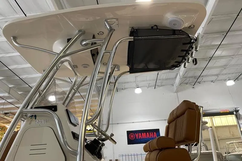 Slide: The Image of 2025 Key West 239 FS boat interior with Yamaha sign in the background. - 18