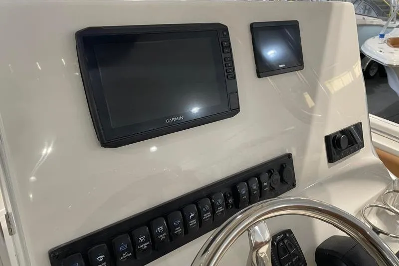 Slide: The Image of Dashboard of 2025 Key West 239 FS boat with Garmin navigation system. - 33