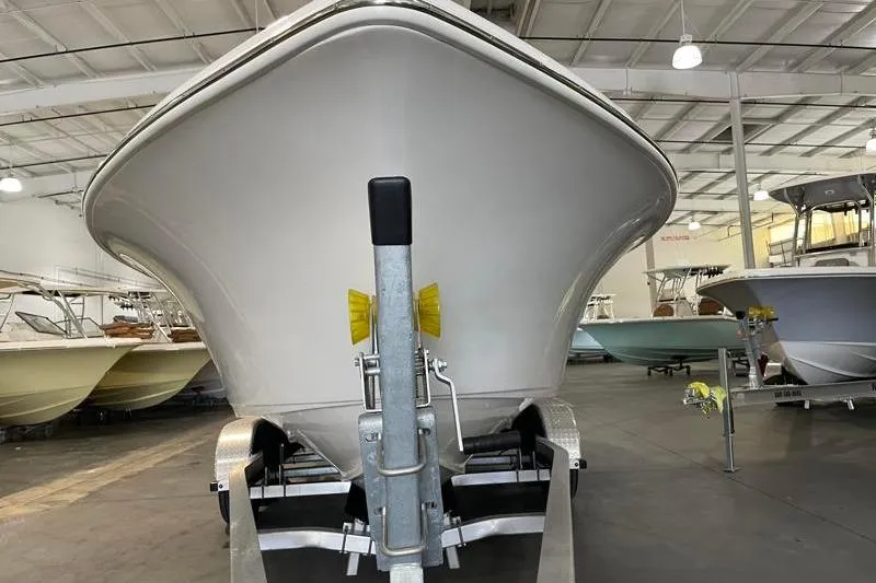 Slide: The Image of 2025 Key West 239 FS boat on trailer in indoor showroom. - 6