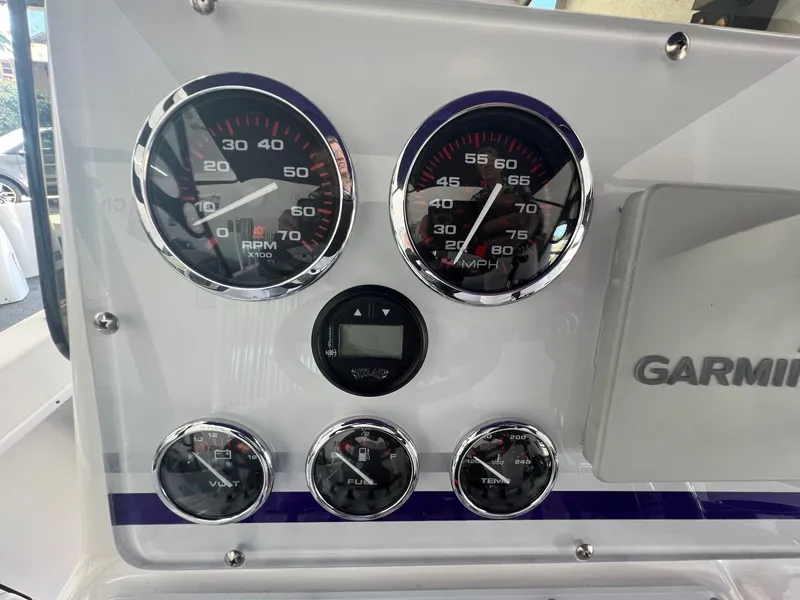 Slide: The Image of Dashboard of a 2018 Concept 23 boat with Garmin device. - 14