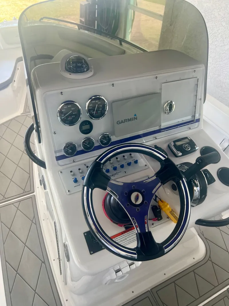 Slide: The Image of 2018 Concept 23 boat helm with Garmin system. - 6