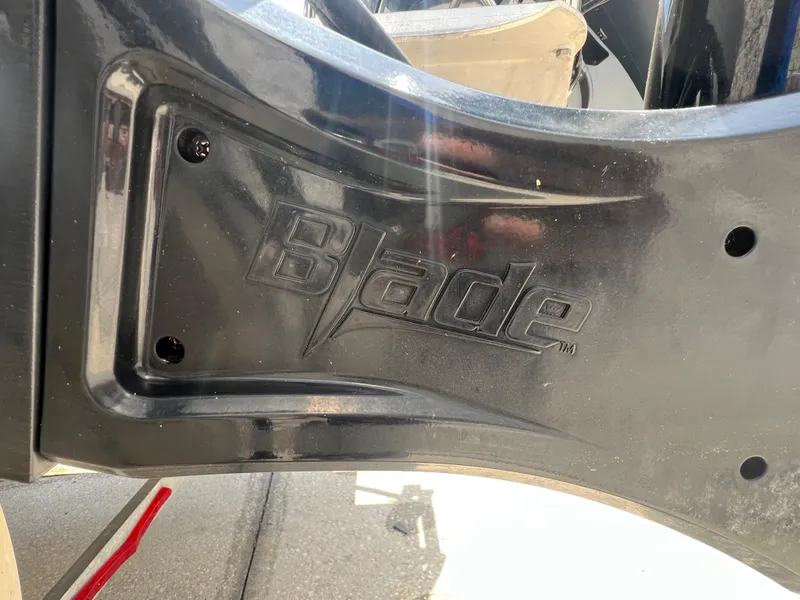 Slide: The Image of Close-up of a 2022 Bennington 22 LS boat part with "Blade" branding. - 24