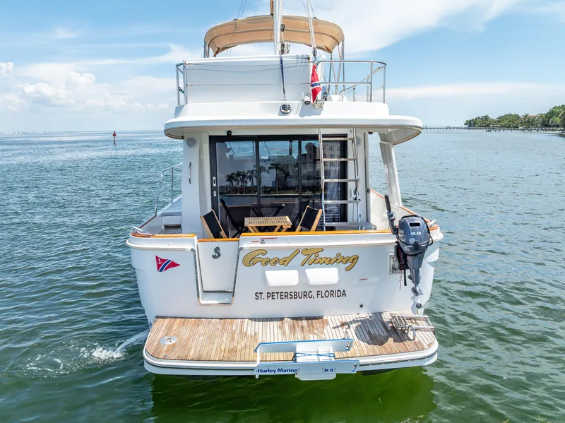 Slide: The Image of 2015 Beneteau Swift Trawler 34, "Good Timing," on water in St. Petersburg, Florida. - 9